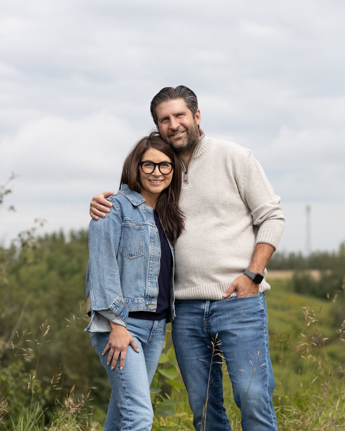 Ben Lotery and his wife together in a field in the riding
