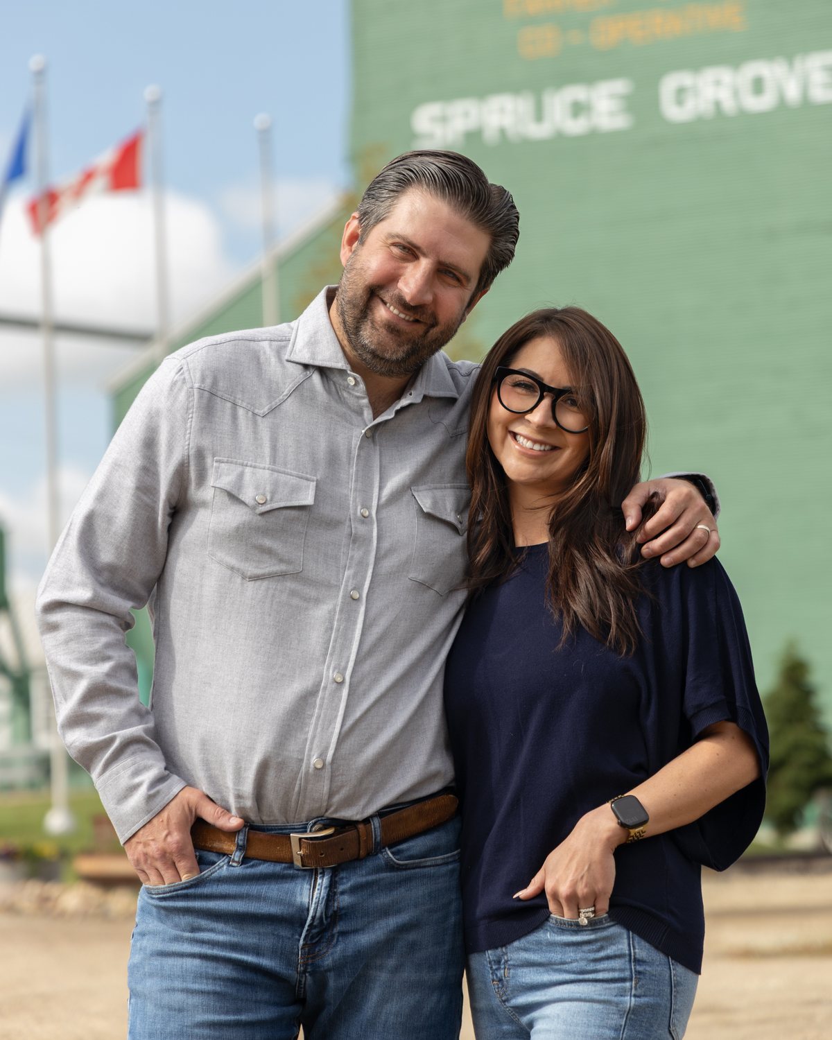 Ben Lotery with his wife outside the Alberta Wheat Pool elevator in Spruce Grove